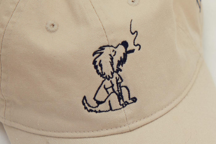 Dad Grass Cream White Dad Hat With Rollie Dog Smoking On It Close Up