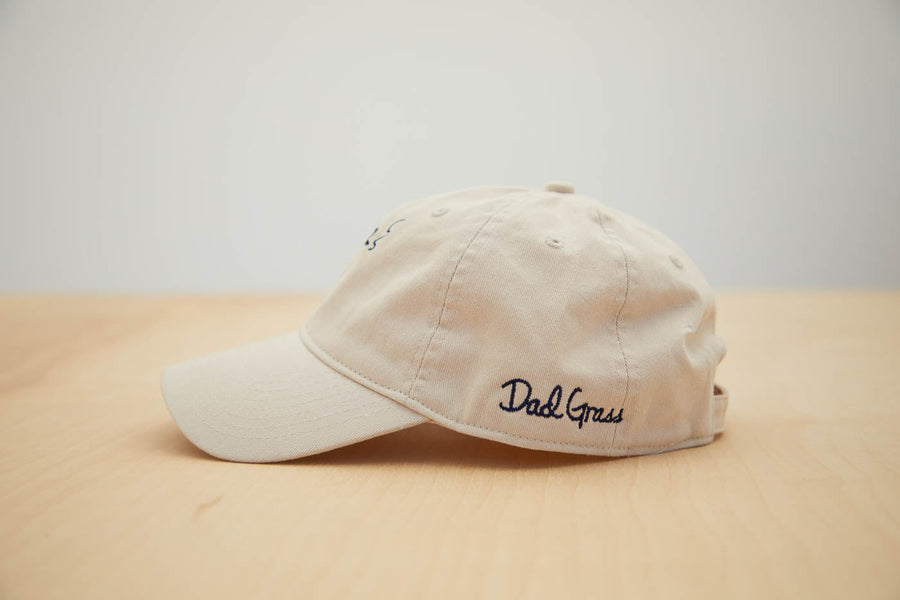 Dad Grass Cream White Dad Hat With Dad Grass Written On It Side View